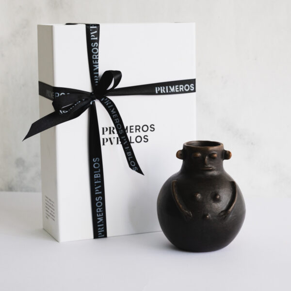 metawe antropomorfo negro caja